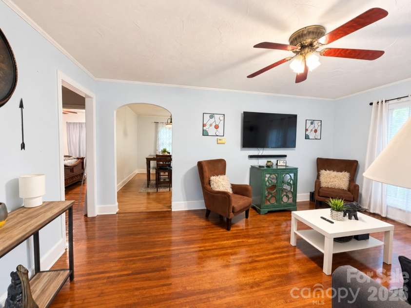 154 Shamrock Street, Concord, NC 28025.  MLS# CAR4421118, YatesRealty ID 49574. Living room leading into kitchen