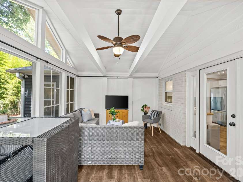 7400 Thorncliff Drive, Charlotte, NC 28210.  MLS# CAR4418127, YatesRealty ID 49580. Light-filled sunroom