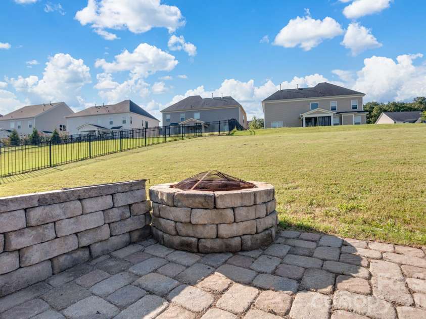 494 Cherry Blossom Avenue, Concord, NC 28027.  MLS# CAR4420777, YatesRealty ID 49583. Fire Pit
