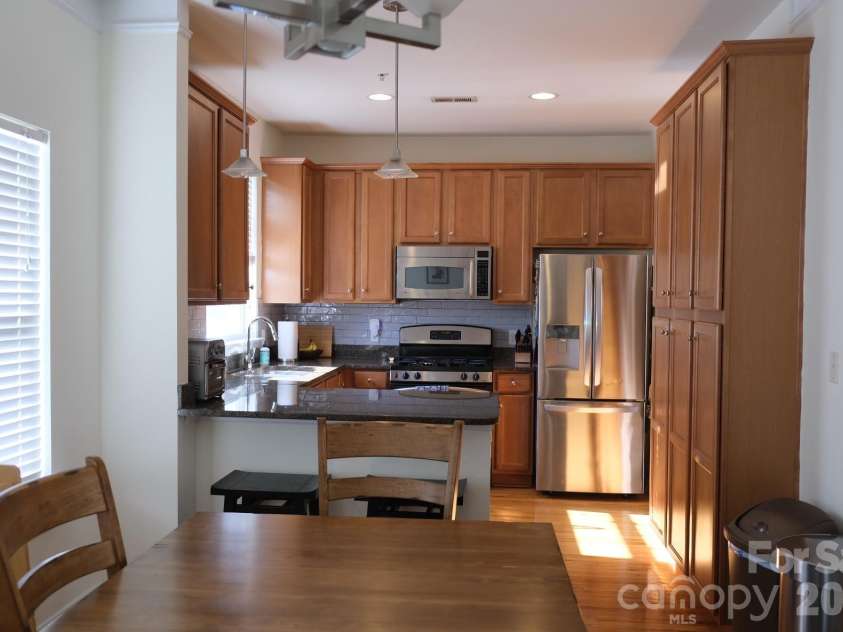 930 Gracie Way, Charlotte, NC 28204.  MLS# CAR4405829, YatesRealty ID 49591. Dining and Kitchen