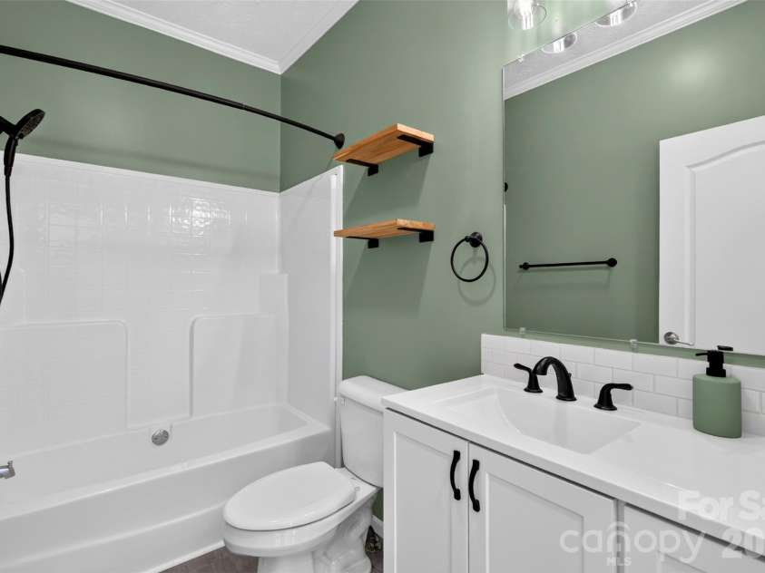6 Enochs Way, Fletcher, NC 28732.  MLS# CAR4422708, YatesRealty ID 49593. Guest bath