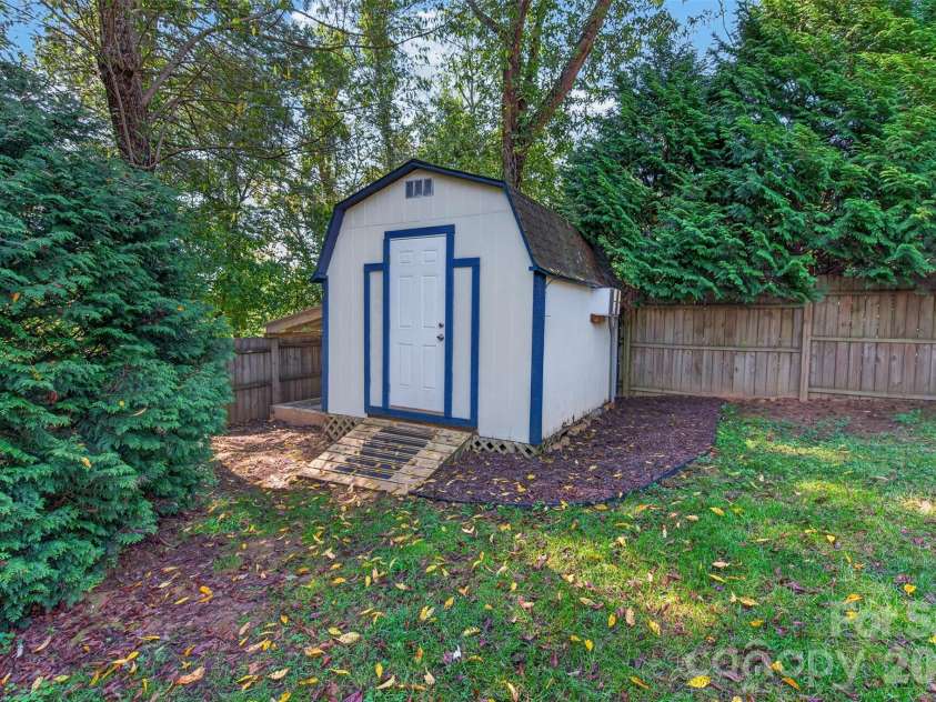 6 Enochs Way, Fletcher, NC 28732.  MLS# CAR4422708, YatesRealty ID 49593. Insulated/powered shed