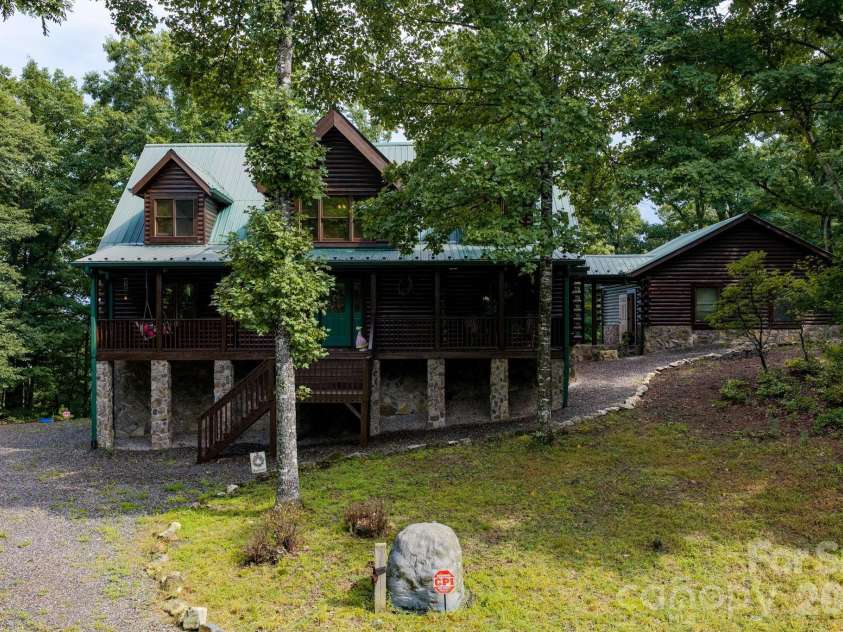 2235 Buck Mountain Road, Purlear, NC 28665.  MLS# CAR4422892, YatesRealty ID 49609. Log Cabin In Buck Mountain