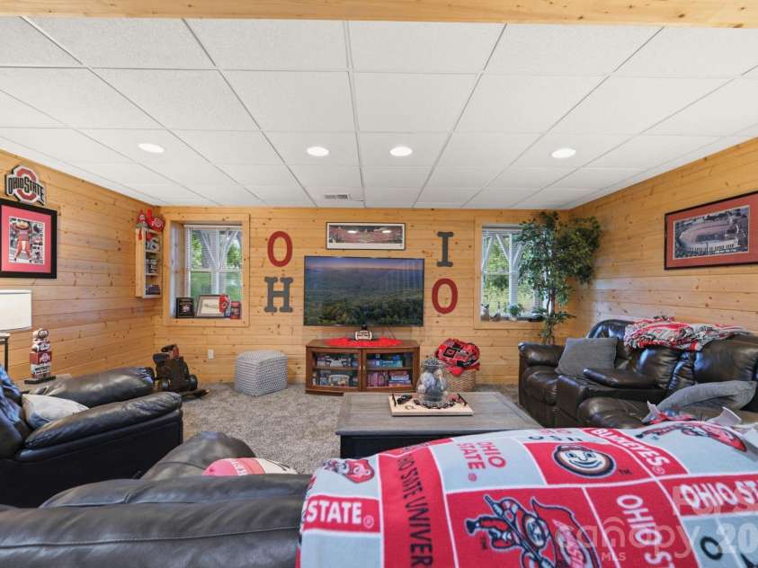 2235 Buck Mountain Road, Purlear, NC 28665.  MLS# CAR4422892, YatesRealty ID 49609. Lower Level Family Room