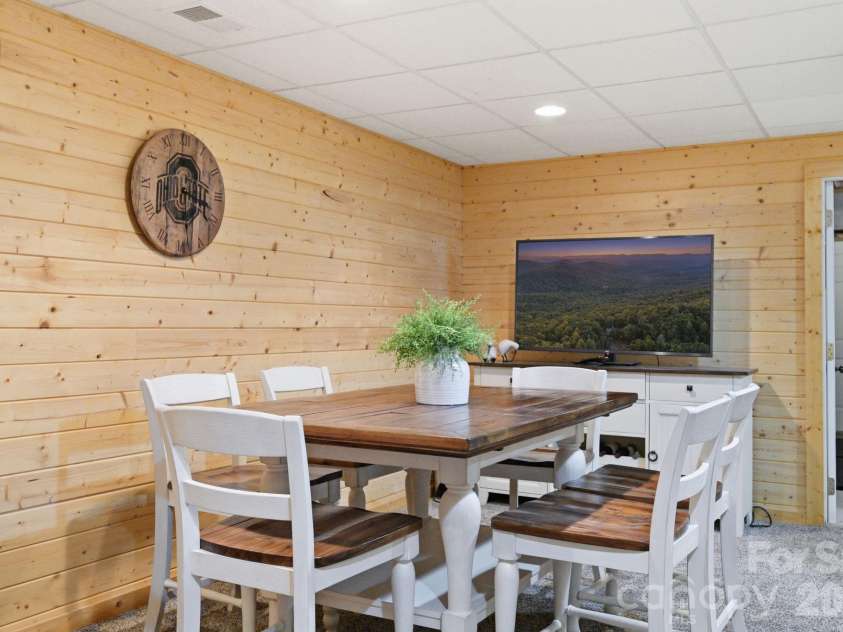 2235 Buck Mountain Road, Purlear, NC 28665.  MLS# CAR4422892, YatesRealty ID 49609. Lower Level Game Room
