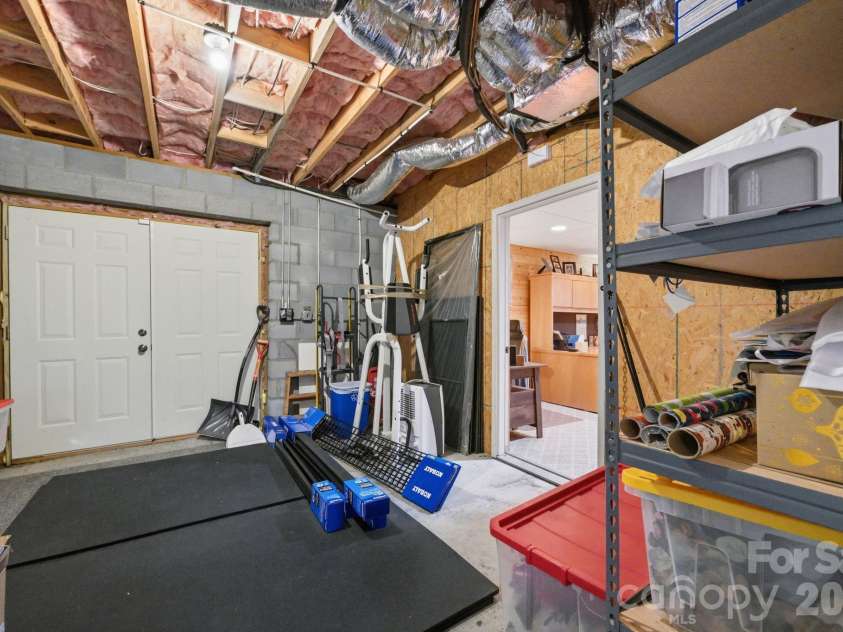 2235 Buck Mountain Road, Purlear, NC 28665.  MLS# CAR4422892, YatesRealty ID 49609. Lower Level Storage Area