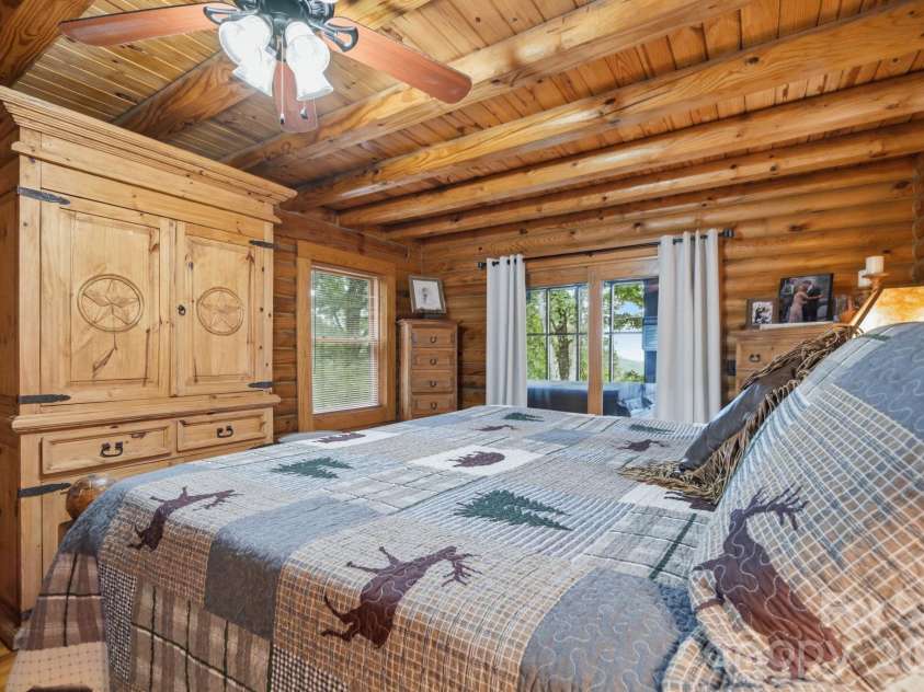 2235 Buck Mountain Road, Purlear, NC 28665.  MLS# CAR4422892, YatesRealty ID 49609. Main Level Primary Bedroom with Ensuite Bathroom
