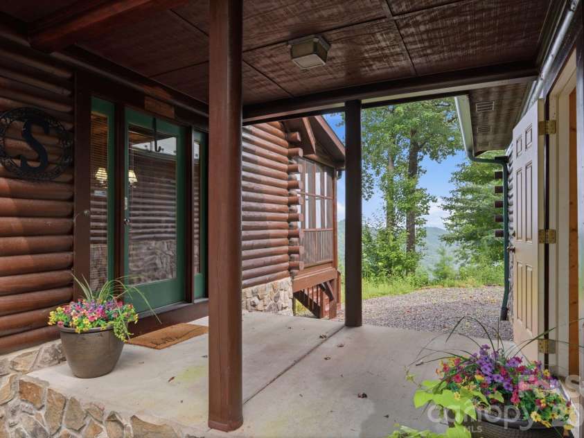 2235 Buck Mountain Road, Purlear, NC 28665.  MLS# CAR4422892, YatesRealty ID 49609. Side Entrance/Breezeway to Garage
