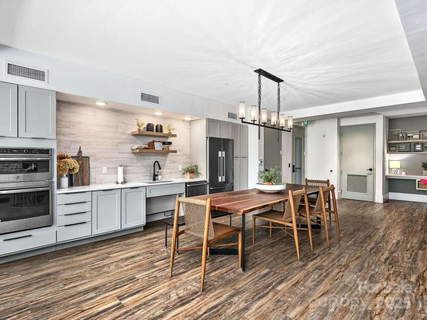 55 Market Street, Asheville, NC 28801.  MLS# CAR4285668, YatesRealty ID 4962. Community space near Foyer