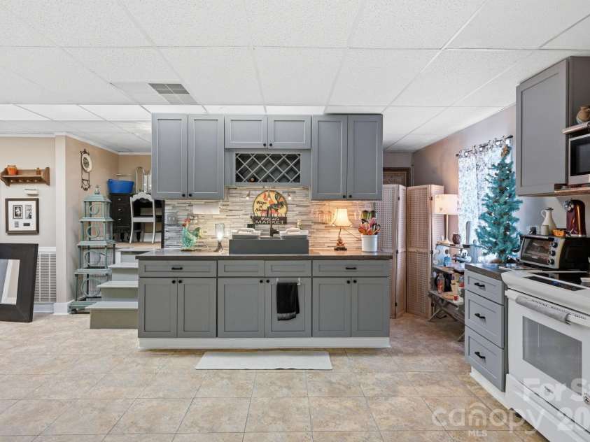 4420 Tucker Road, Belmont, NC 28012.  MLS# CAR4398600, YatesRealty ID 49629. Basement Kitchen