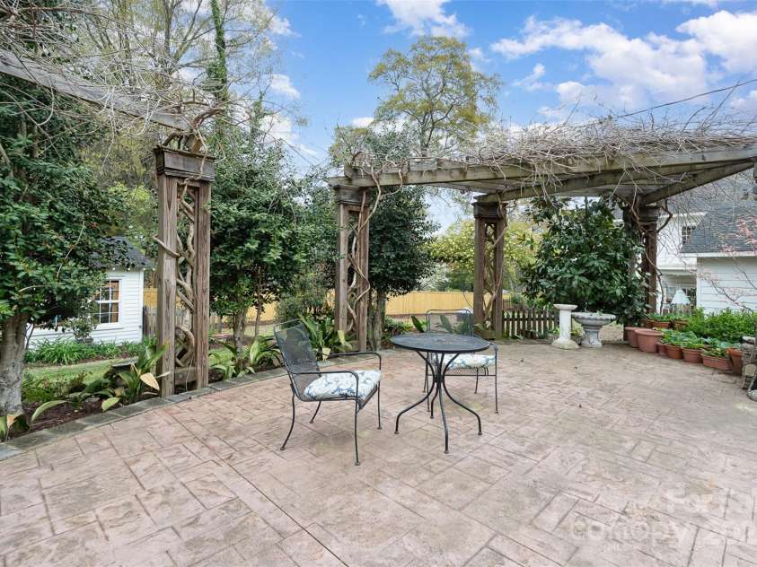 1313 York Road, Gastonia, NC 28052.  MLS# CAR4238759, YatesRealty ID 4964. Gardens: -Mature landscaping with crepe myrtles, camellias,azaleas, buttery bushes, maples, oaks, and magnolias-Enhanced with daylilies, crinums, hostas, ferns,gardenias, hydrangeas, and boxwoods