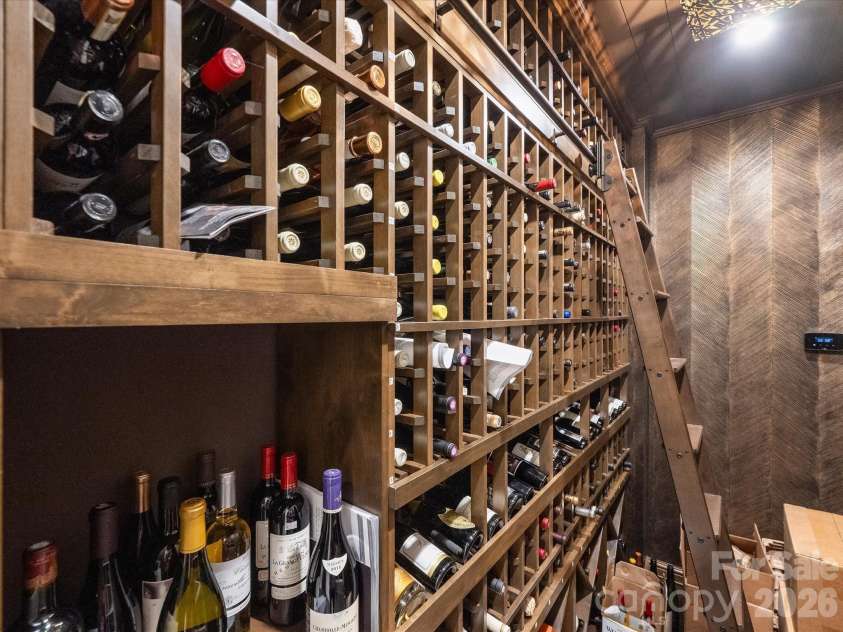 2414 Forest Drive, Charlotte, NC 28211.  MLS# CAR4420564, YatesRealty ID 49641. Climate-controlled wine room