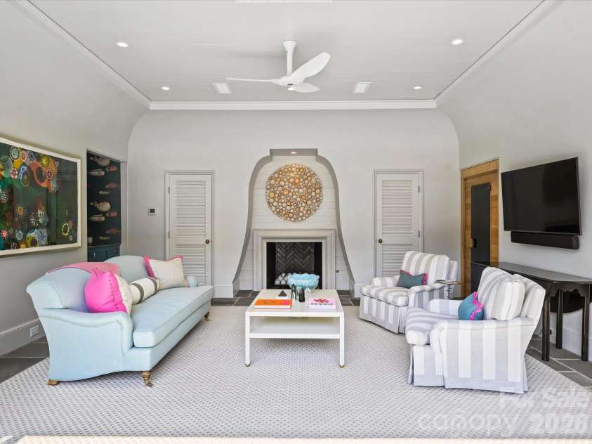 2414 Forest Drive, Charlotte, NC 28211.  MLS# CAR4420564, YatesRealty ID 49641. Pool house has fireplace and Nano doors that open it to the backyard