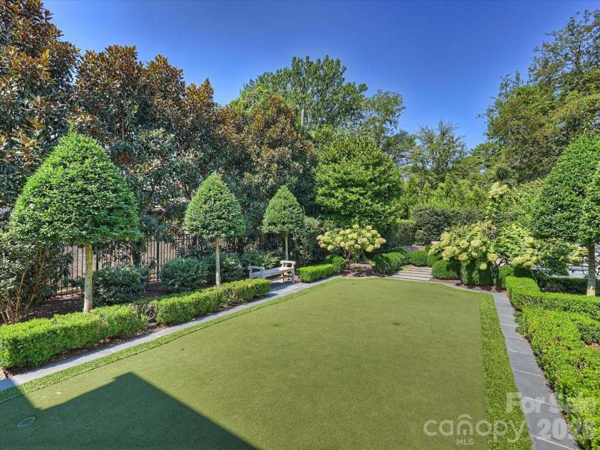 2414 Forest Drive, Charlotte, NC 28211.  MLS# CAR4420564, YatesRealty ID 49641. Putting green in the gardens