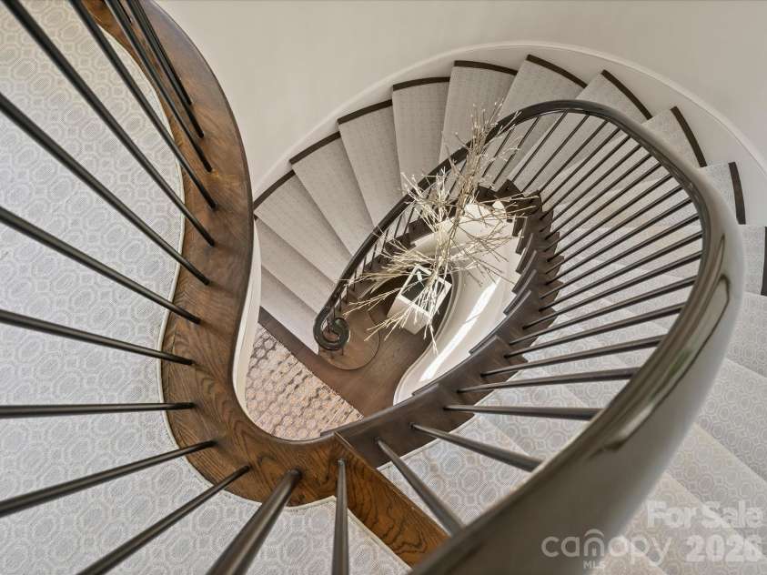 2414 Forest Drive, Charlotte, NC 28211.  MLS# CAR4420564, YatesRealty ID 49641. Staircase is a work of art