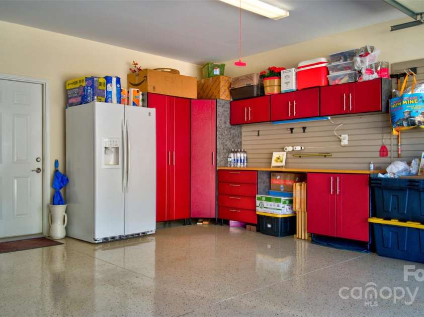 8518 Christalina Lane, Denver, NC 28037.  MLS# CAR4241394, YatesRealty ID 4965. Custom work bench and cabinets