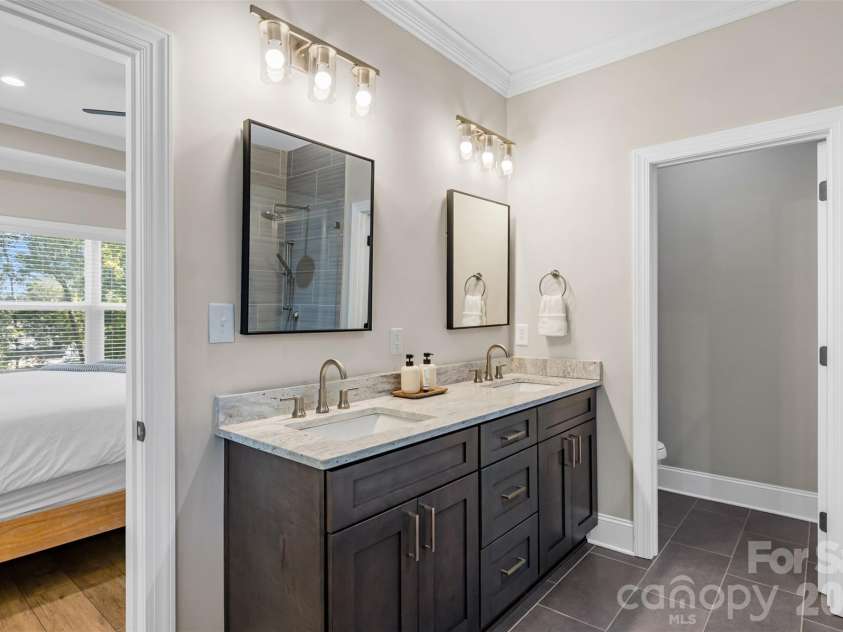 787 Morrison Farm Road, Troutman, NC 28166.  MLS# CAR4416410, YatesRealty ID 49657. Double Vanity in Primary Bathroom