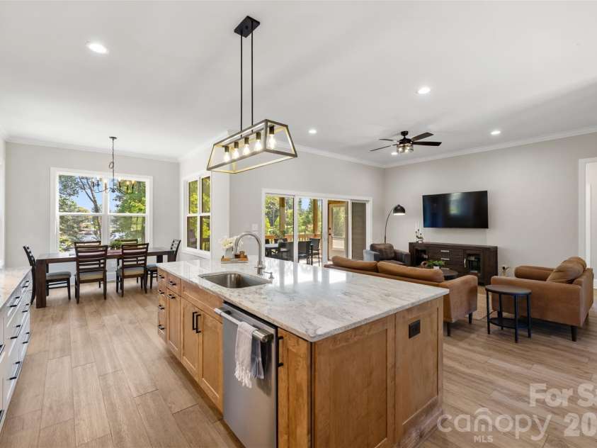 787 Morrison Farm Road, Troutman, NC 28166.  MLS# CAR4416410, YatesRealty ID 49657. Kitchen overlooking Living Room