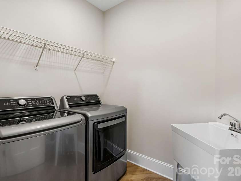 787 Morrison Farm Road, Troutman, NC 28166.  MLS# CAR4416410, YatesRealty ID 49657. Laundry Room