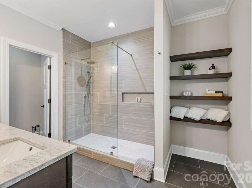 787 Morrison Farm Road, Troutman, NC 28166.  MLS# CAR4416410, YatesRealty ID 49657. Primary En-Suite Bathroom