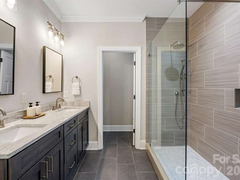 787 Morrison Farm Road, Troutman, NC 28166.  MLS# CAR4416410, YatesRealty ID 49657. Primary En-Suite Bathroom