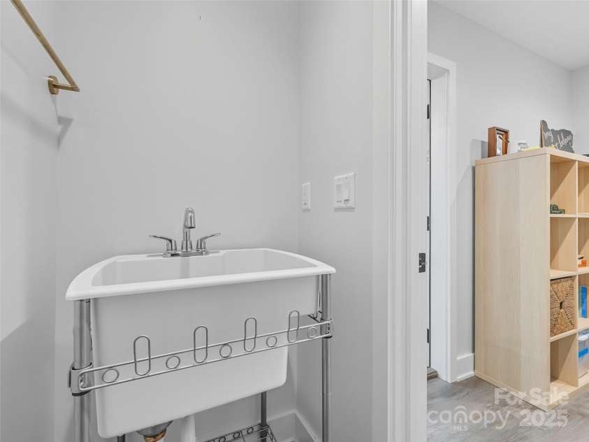 584 Springbrook Lane, Brevard, NC 28712.  MLS# CAR4308876, YatesRealty ID 4967. Basement half bath