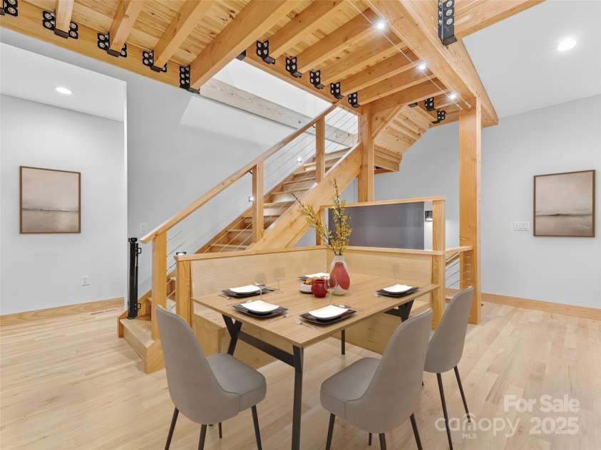 584 Springbrook Lane, Brevard, NC 28712.  MLS# CAR4308876, YatesRealty ID 4967. Dining area virtually staged