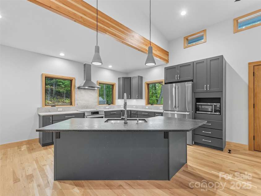 584 Springbrook Lane, Brevard, NC 28712.  MLS# CAR4308876, YatesRealty ID 4967. Large island