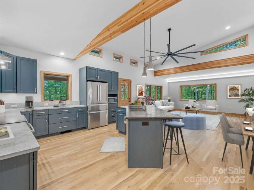 584 Springbrook Lane, Brevard, NC 28712.  MLS# CAR4308876, YatesRealty ID 4967. Open floor plan virtually staged