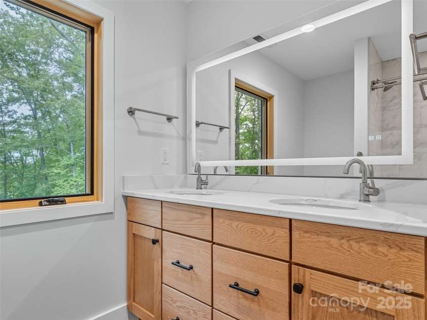 584 Springbrook Lane, Brevard, NC 28712.  MLS# CAR4308876, YatesRealty ID 4967. Shared upstairs bath