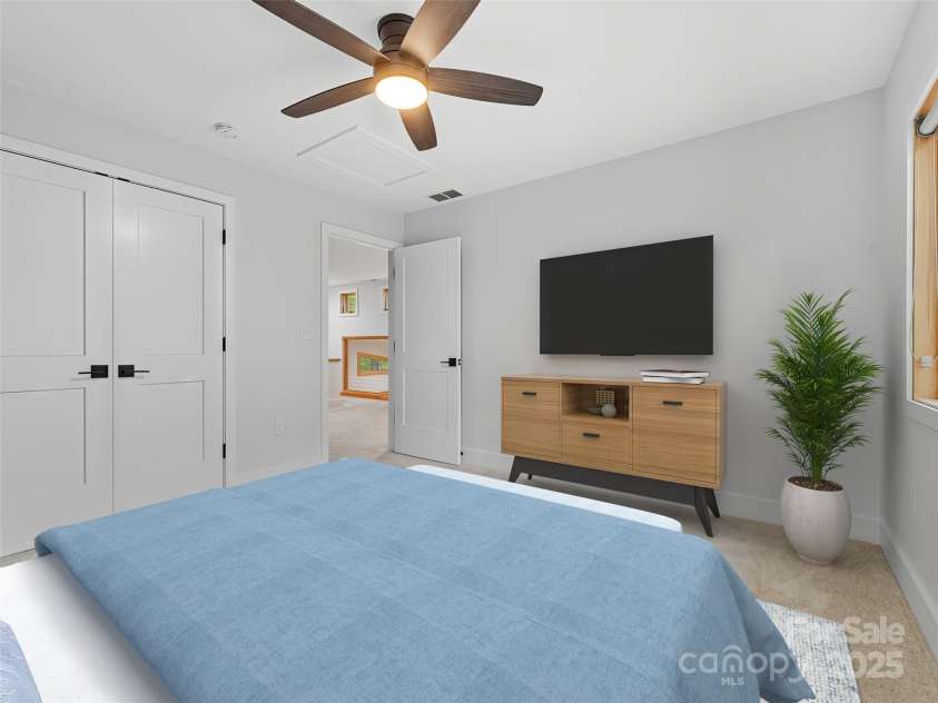 584 Springbrook Lane, Brevard, NC 28712.  MLS# CAR4308876, YatesRealty ID 4967. Upper level 2nd bedroom virtually staged