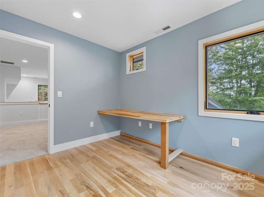 584 Springbrook Lane, Brevard, NC 28712.  MLS# CAR4308876, YatesRealty ID 4967. Upper level office