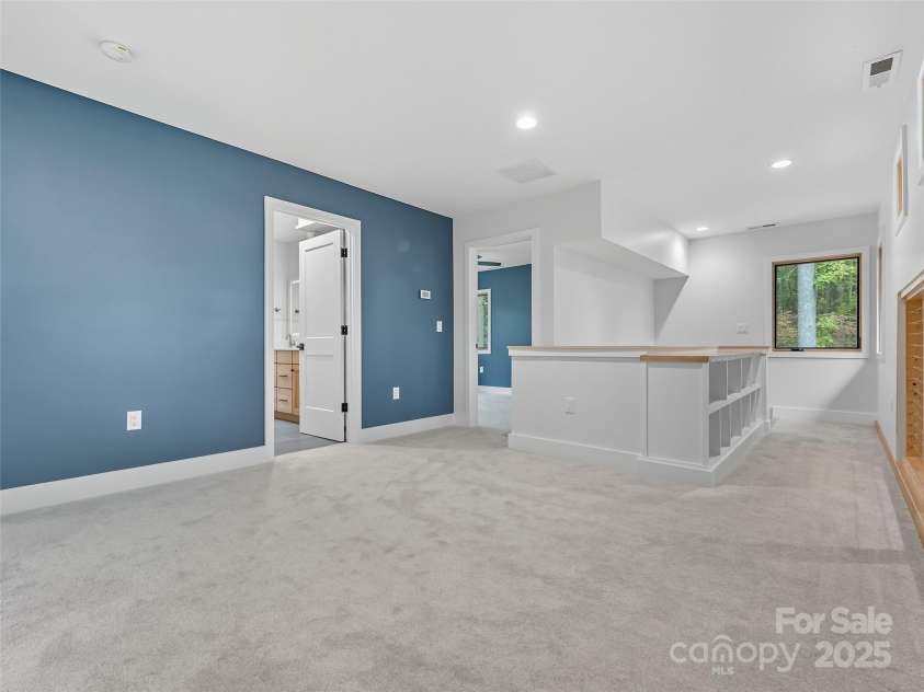 584 Springbrook Lane, Brevard, NC 28712.  MLS# CAR4308876, YatesRealty ID 4967. Upstairs loft flex space