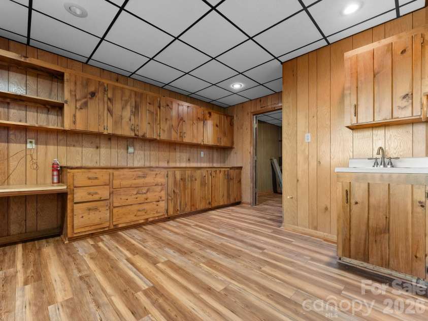 977 Morning Ride Drive, Columbus, NC 28722.  MLS# CAR4419017, YatesRealty ID 49673. Den with sink and office area