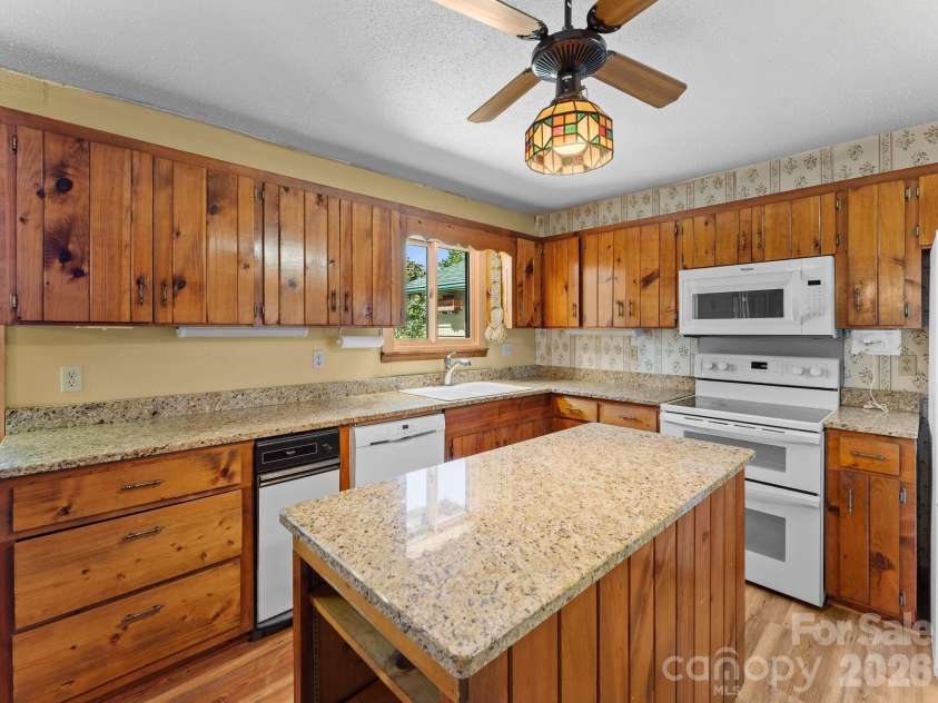 977 Morning Ride Drive, Columbus, NC 28722.  MLS# CAR4419017, YatesRealty ID 49673. Kitchen has new appliances, (except for the trash compactor)