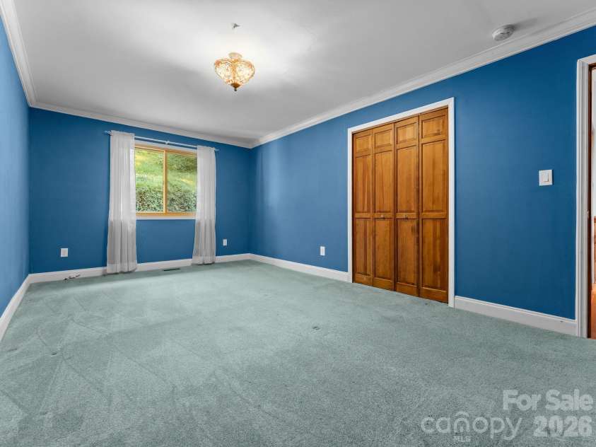 977 Morning Ride Drive, Columbus, NC 28722.  MLS# CAR4419017, YatesRealty ID 49673. Main level bedroom with closet
