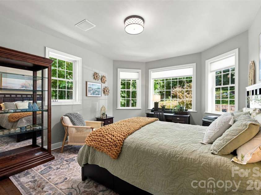99 Distant View Drive, Asheville, NC 28803.  MLS# CAR4421771, YatesRealty ID 49685. Comfortable Guest Bedroom on Main