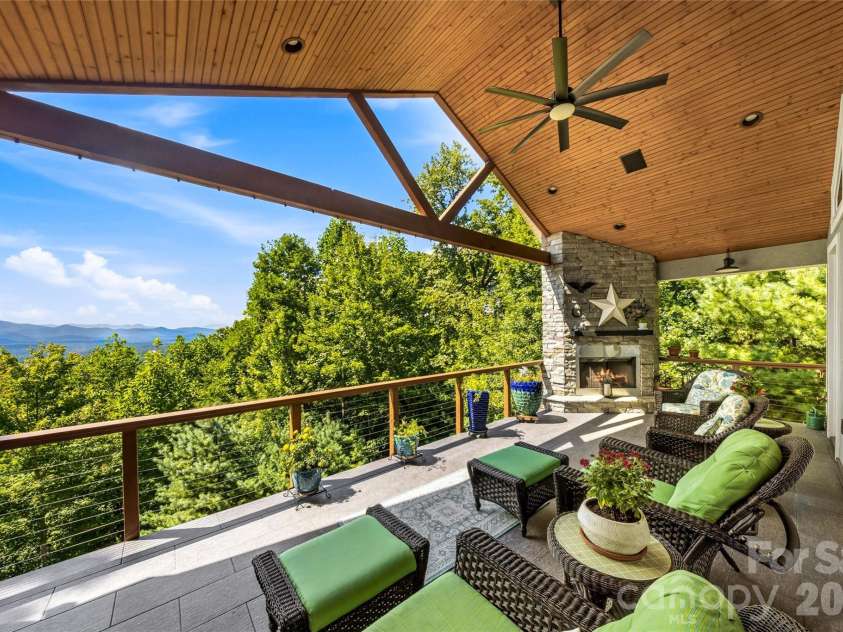 99 Distant View Drive, Asheville, NC 28803.  MLS# CAR4421771, YatesRealty ID 49685. Covered Deck for Year-Round Enjoyment