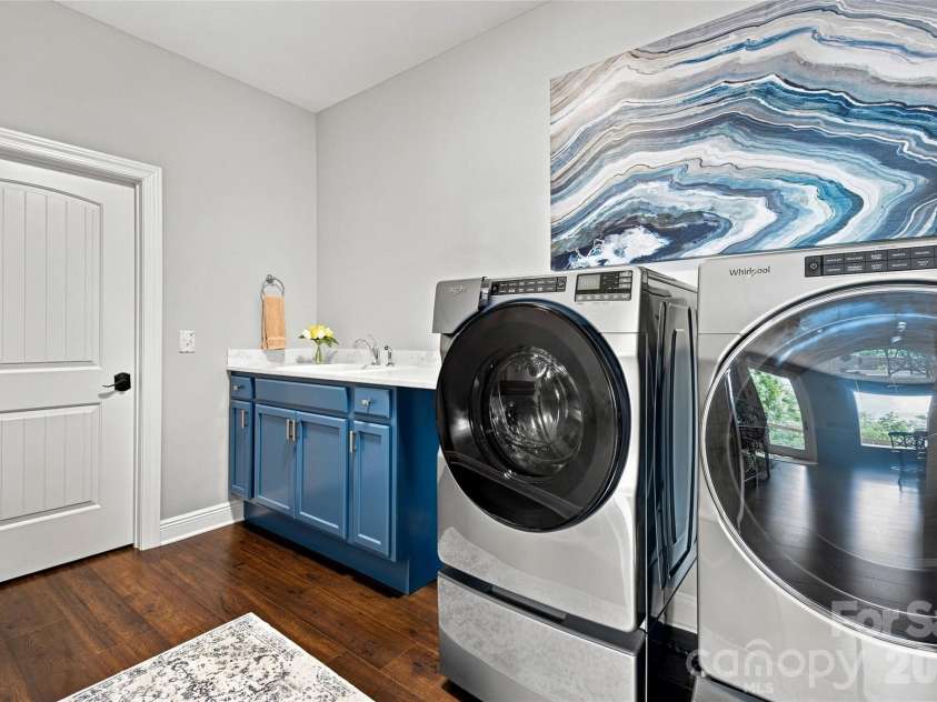 99 Distant View Drive, Asheville, NC 28803.  MLS# CAR4421771, YatesRealty ID 49685. Laundry Room with Utility Sink & Storage