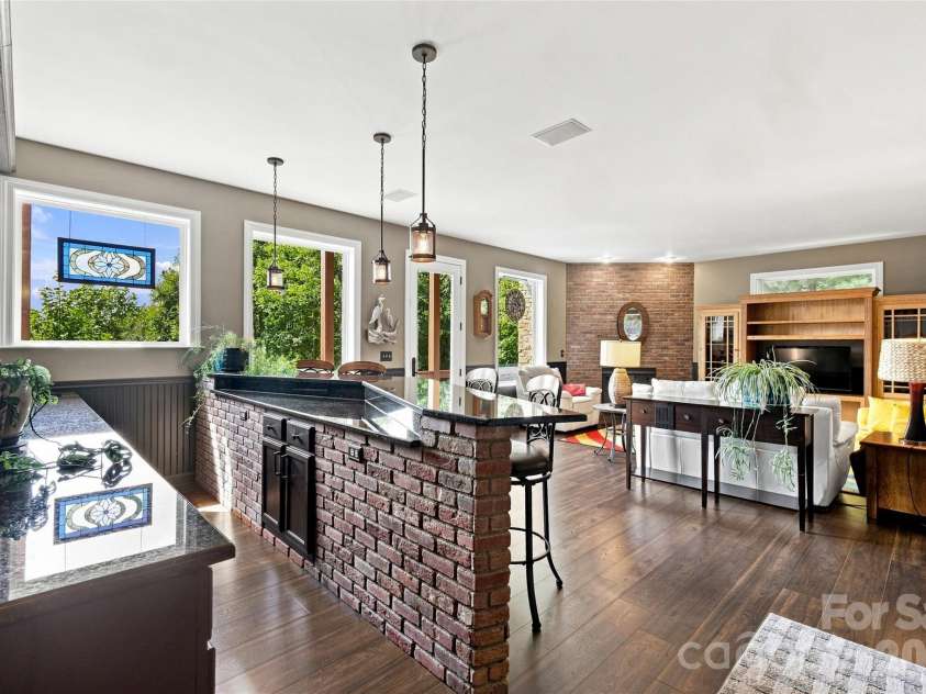 99 Distant View Drive, Asheville, NC 28803.  MLS# CAR4421771, YatesRealty ID 49685. Spacious Lower-Level Entertainment Area