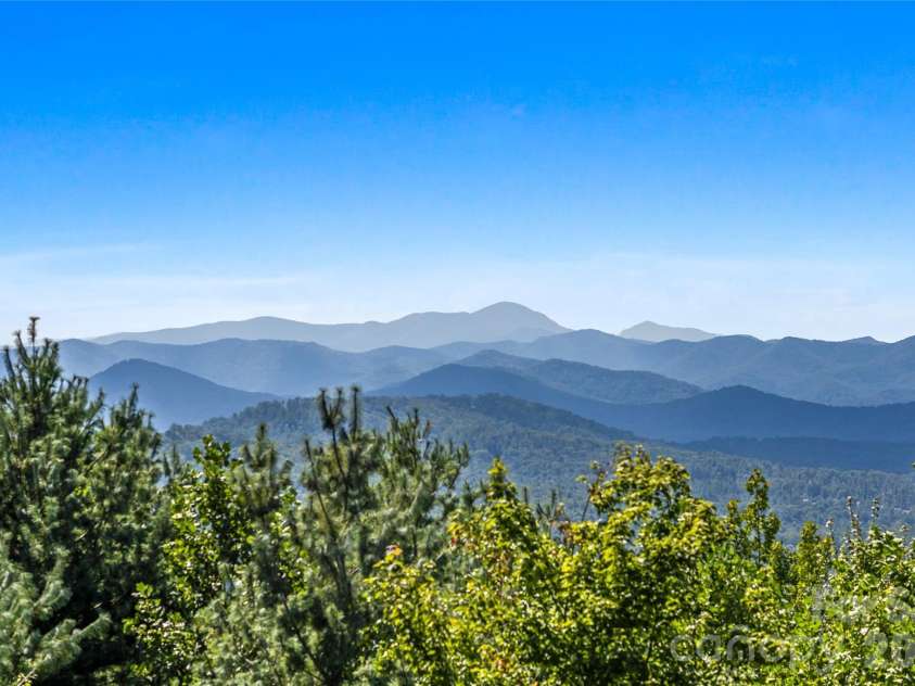99 Distant View Drive, Asheville, NC 28803.  MLS# CAR4421771, YatesRealty ID 49685. Spectacular Long-Range Mountain Views