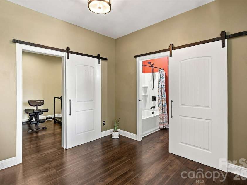99 Distant View Drive, Asheville, NC 28803.  MLS# CAR4421771, YatesRealty ID 49685. Versatile Bonus or Flex Space