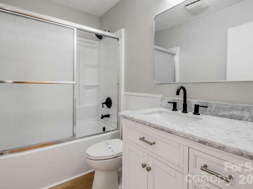 15 Old Youngs Cove Road, Candler, NC 28715.  MLS# CAR4422903, YatesRealty ID 49686. 