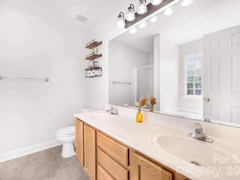 7316 Oxford Bluff Drive, Stanley, NC 28164.  MLS# CAR4353906, YatesRealty ID 4970. Master Bathroom