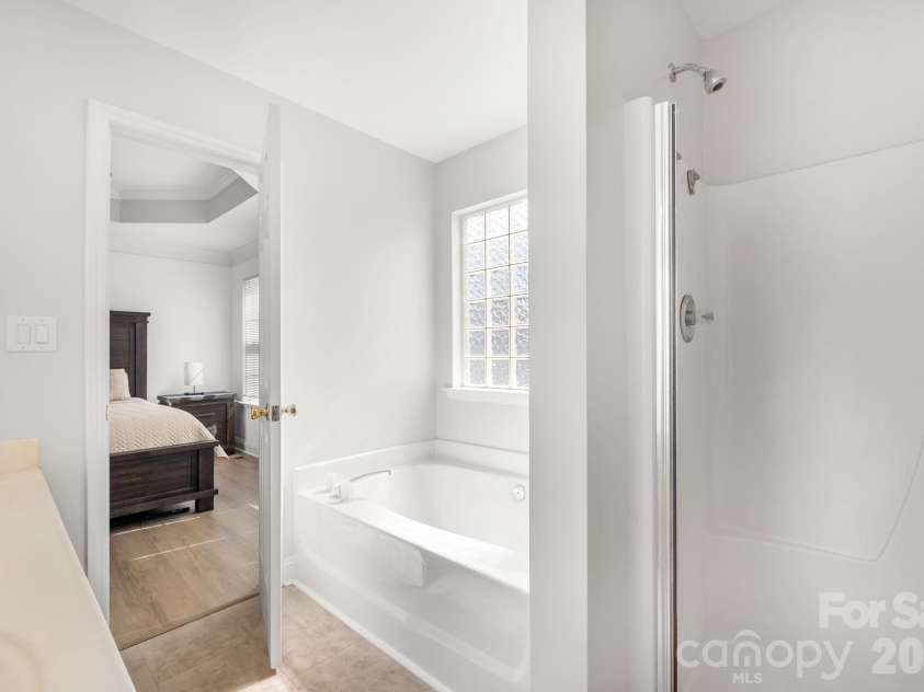 7316 Oxford Bluff Drive, Stanley, NC 28164.  MLS# CAR4353906, YatesRealty ID 4970. Master Bathroom