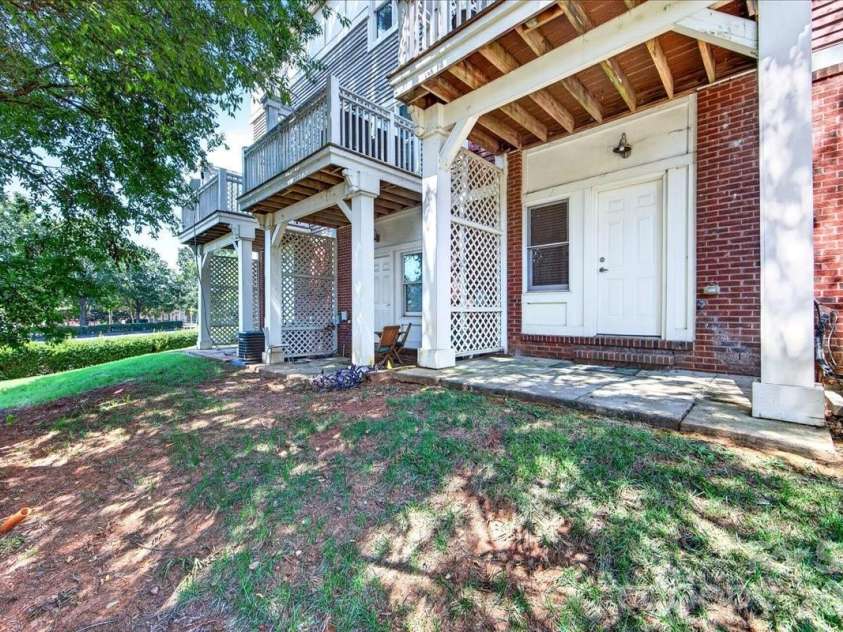 783 Grandin Road, Charlotte, NC 28208.  MLS# CAR4408667, YatesRealty ID 49700. Back patio off 3rd Bedroom with small grass area