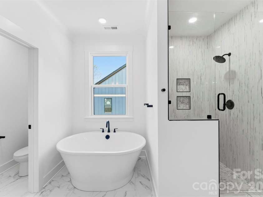 209 Parkdale Drive, Belmont, NC 28012.  MLS# CAR4422929, YatesRealty ID 49701. Primary bathroom