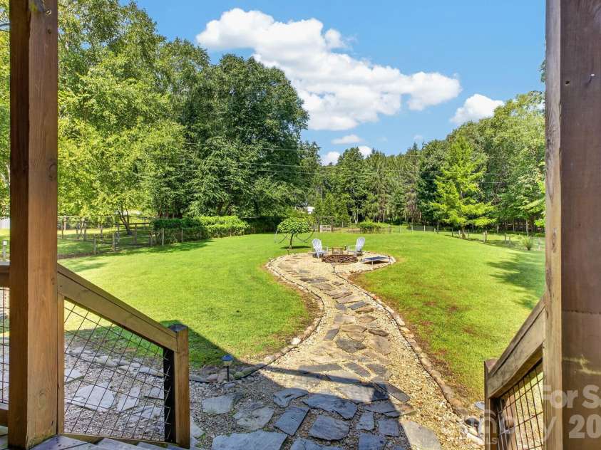73 Hudson Hollow, Horse Shoe, NC 28742.  MLS# CAR4418438, YatesRealty ID 49706. Back Yard