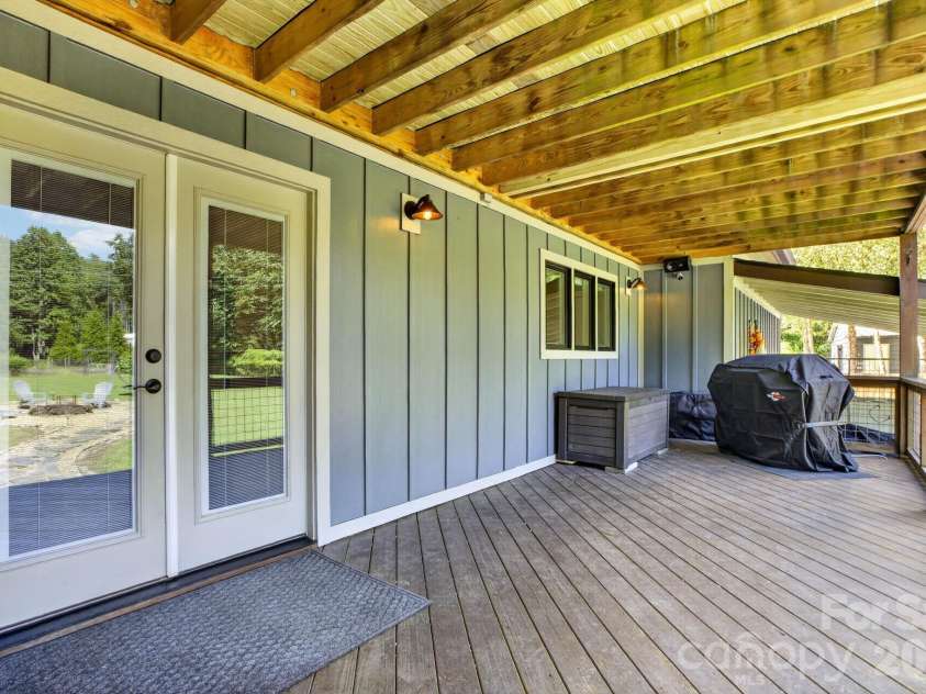 73 Hudson Hollow, Horse Shoe, NC 28742.  MLS# CAR4418438, YatesRealty ID 49706. Covered deck