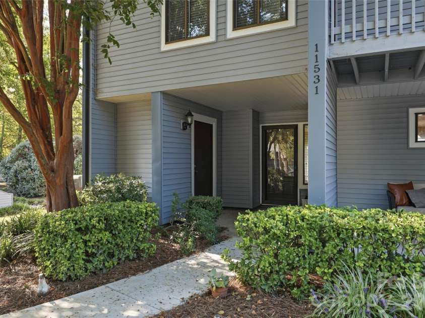 11531 Turn Stone Court, Charlotte, NC 28226.  MLS# CAR4422419, YatesRealty ID 49715. This end unit has TWO covered front porches!